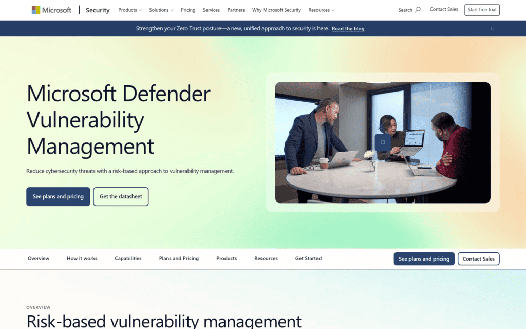 Microsoft Defender Vulnerability Management page, a vulnerability scanner with a risk-based approach, beside a team photo